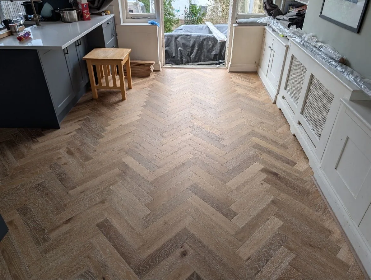 Smoked white oak herringbone laid in a kitchen in Norwood, south London